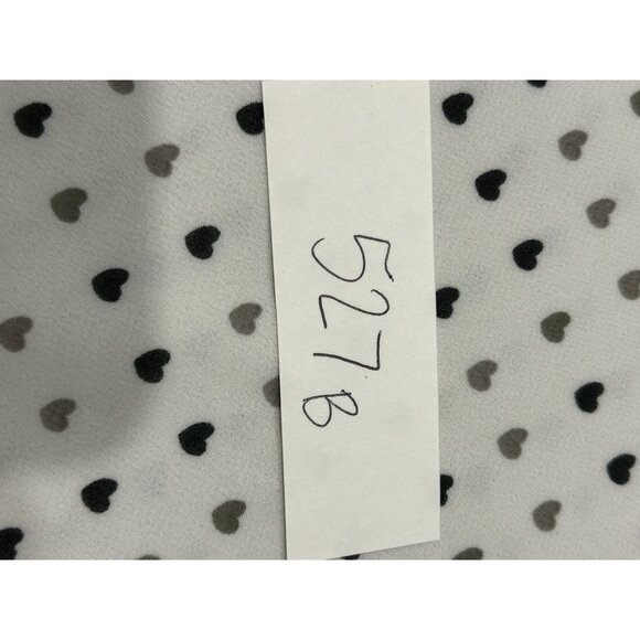 Heart-Printed Ivory Sleeveless Blouse With Ruffled Detail V-Neckline - Picture 9 of 9